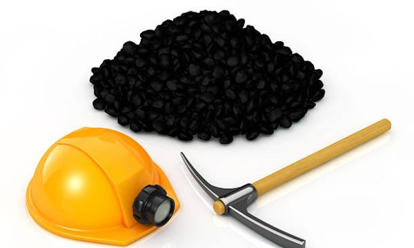 The mining equipment and coal on white background