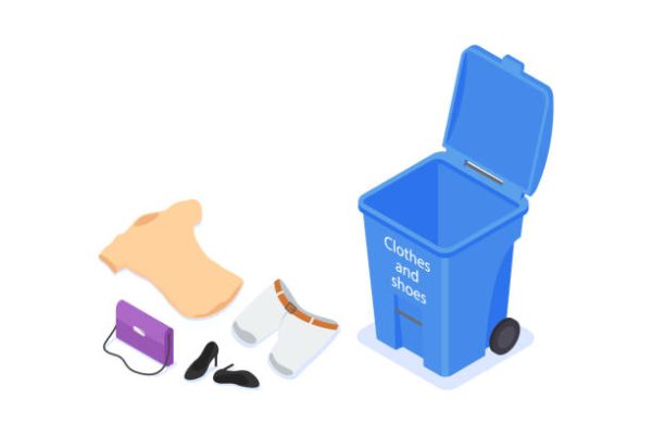 Sorting and processing waste from clothes and shoes. Vector isometric illustration on a white background.