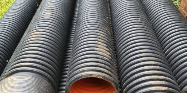 HDPE Double Wall Corrugated Pipes for drainage, sewage, rain and waste infrastructure. These pipes are 250mm diameter and 6mts long.